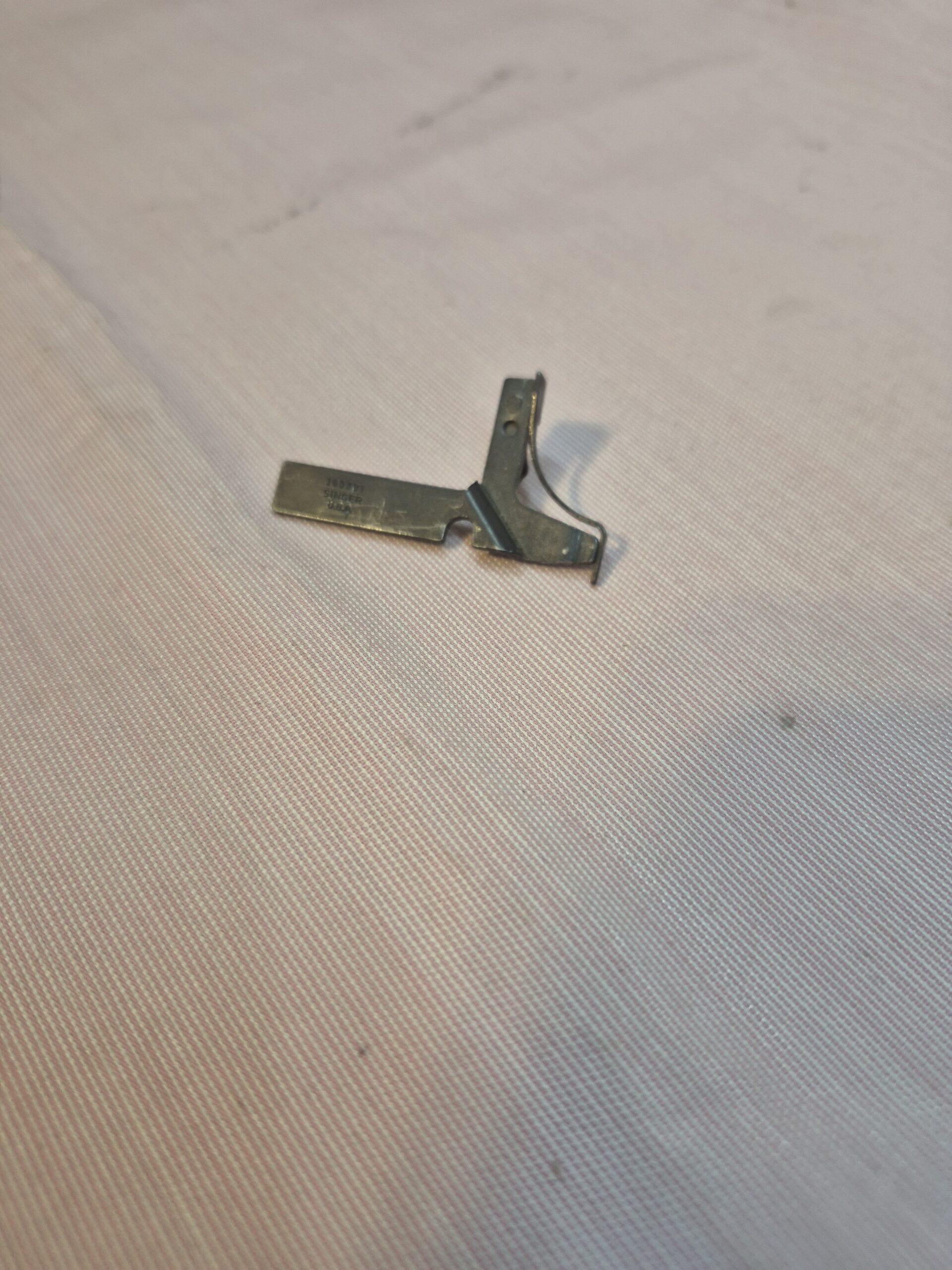 SInger Bobbin Case Position Bracket - Singer Part # 163337
